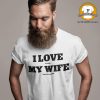A man wearing a t-shirt that reads "I love it when my wife buys more junk"
