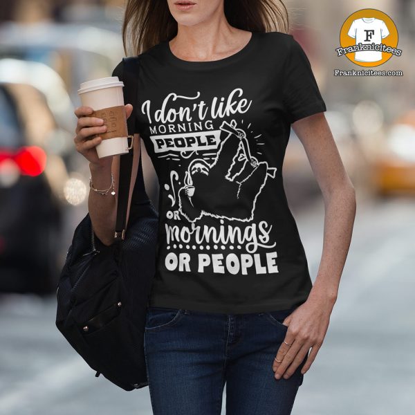 woman wearing a shirt that says I don't like morning people, or mornings, or people.