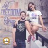 Man and Woman wearing a shirt that says "Let Freedom Ring"
